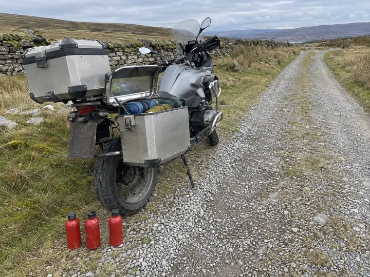 Three expedition fuel bottles. All empty.